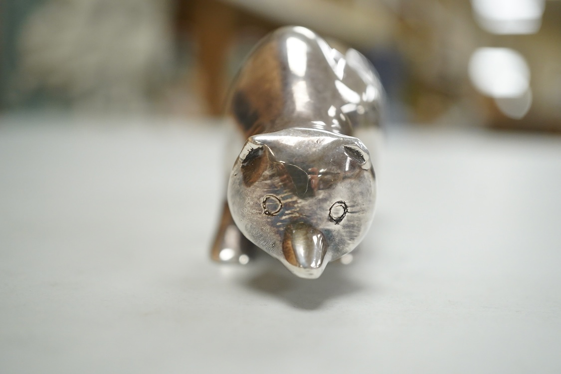 A stylised white metal(stamped 925) miniature model of a bear, length 85mm, height 42mm, 18oz.